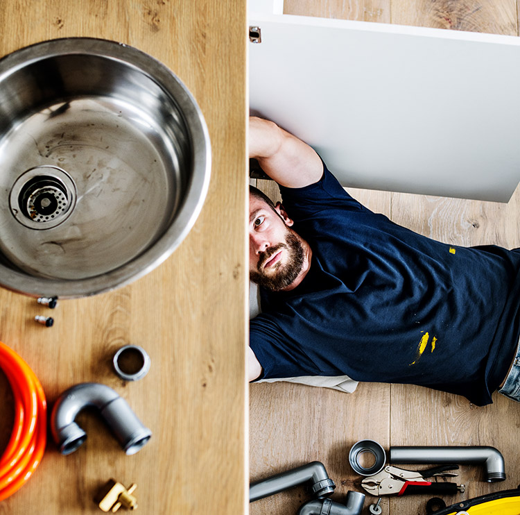 Man Fixing Sink